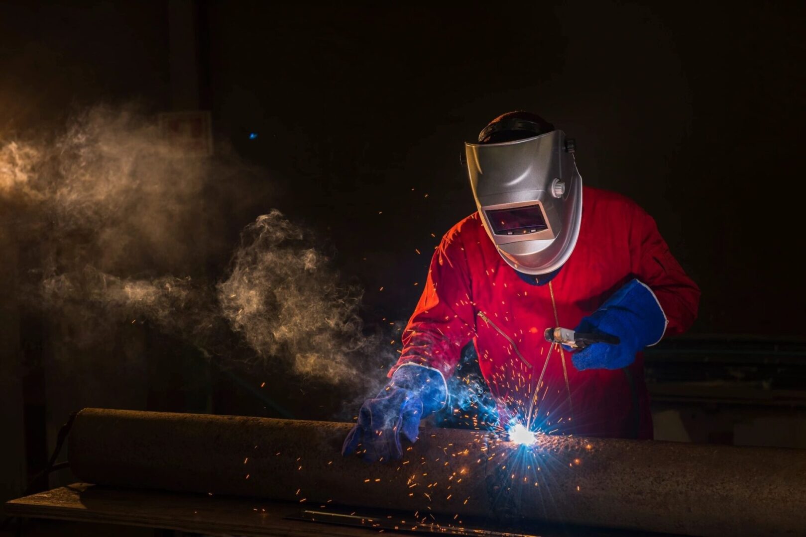 Workshop welder in Red uniform
